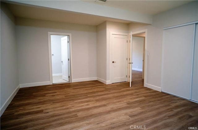 1020 Lantana Dr, Los Angeles, CA 90042 - unfurnished bedroom featuring wood finished floors and baseboards
