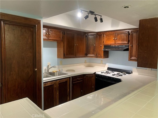 1017 W Bishop St Unit 202, Santa Ana, CA 92703 - kitchen featuring white range with gas stovetop, under cabinet range hood, and tile countertops