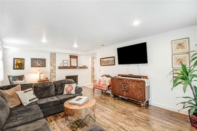 458 Termino Ave, Corona, CA 92879 - living area featuring wood finished floors, a fireplace, and recessed lighting