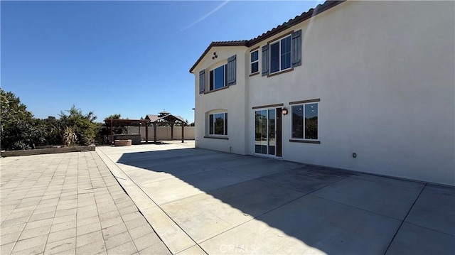 1167 Tesoro Pl, Vista, CA 92081 - back of house featuring stucco siding and a patio