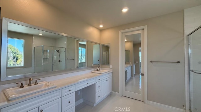 1167 Tesoro Pl, Vista, CA 92081 - bathroom with double vanity, a stall shower, and recessed lighting