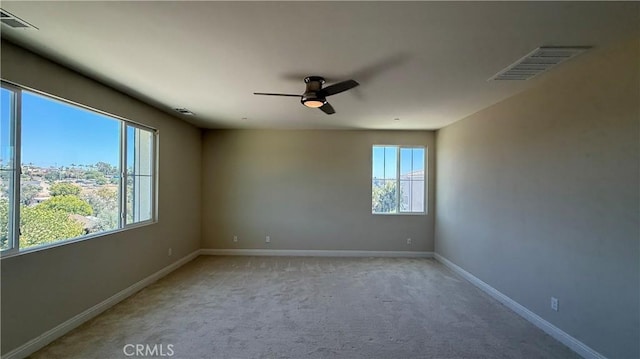 1167 Tesoro Pl, Vista, CA 92081 - empty room featuring a ceiling fan and light colored carpet