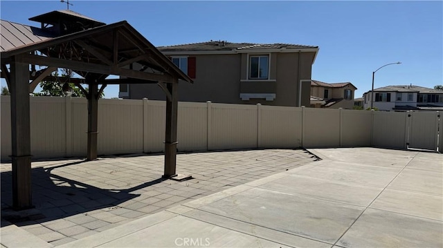 1167 Tesoro Pl, Vista, CA 92081 - view of patio / terrace with a gazebo and a residential view