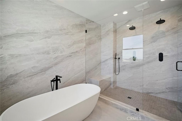 4 Ebony Glade, Laguna Niguel, CA 92677 - bathroom featuring a soaking tub, a marble finish shower, recessed lighting, and tile walls