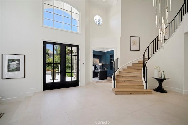 4 Ebony Glade, Laguna Niguel, CA 92677 - tiled foyer with french doors, a towering ceiling, stairway, and healthy amount of natural light