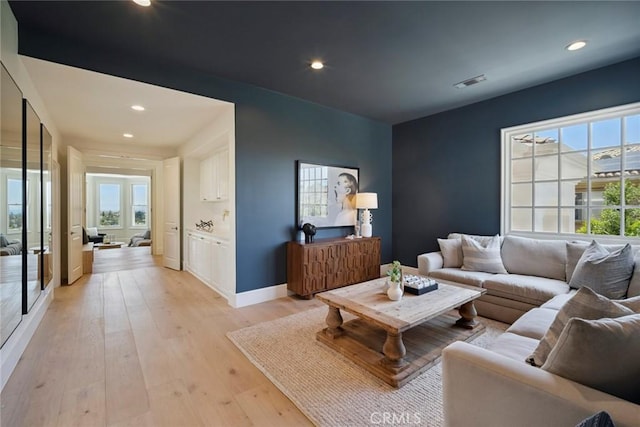 4 Ebony Glade, Laguna Niguel, CA 92677 - living area featuring light wood-style floors, recessed lighting, and healthy amount of natural light
