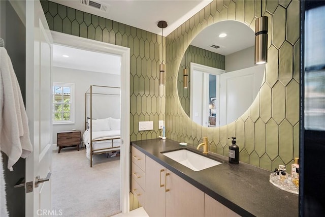 4 Ebony Glade, Laguna Niguel, CA 92677 - bathroom with vanity, connected bathroom, and tasteful backsplash