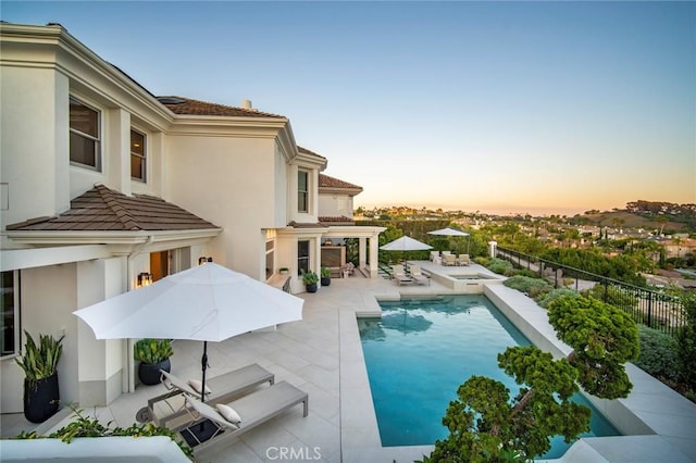 4 Ebony Glade, Laguna Niguel, CA 92677 - pool at dusk featuring a patio area