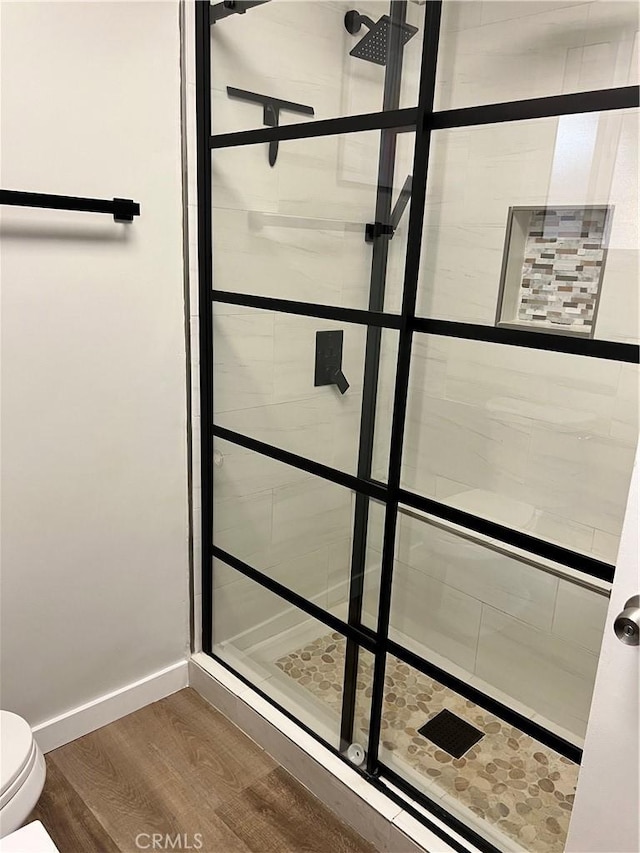 1135 W Coolfield Dr, Covina, CA 91722 - full bathroom with wood finished floors and a shower stall