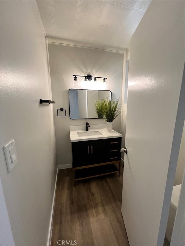 1135 W Coolfield Dr, Covina, CA 91722 - bathroom with wood finished floors and vanity