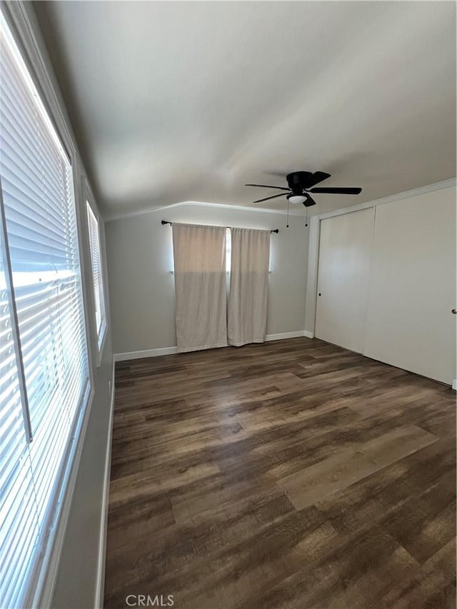 1135 W Coolfield Dr, Covina, CA 91722 - unfurnished room featuring ceiling fan, dark wood-style floors, and vaulted ceiling