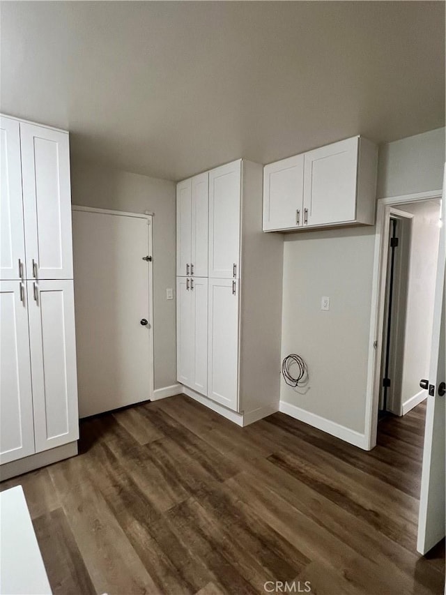 1135 W Coolfield Dr, Covina, CA 91722 - unfurnished bedroom with dark wood finished floors