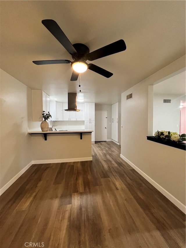 1135 W Coolfield Dr, Covina, CA 91722 - unfurnished living room featuring ceiling fan and dark wood finished floors
