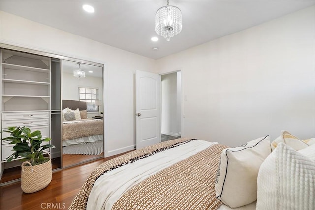 744 S 5th St, Montebello, CA 90640 - bedroom with wood finished floors, a chandelier, recessed lighting, and a closet