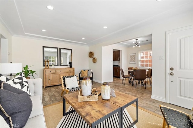 744 S 5th St, Montebello, CA 90640 - living area with light wood-type flooring, crown molding, recessed lighting, and a chandelier