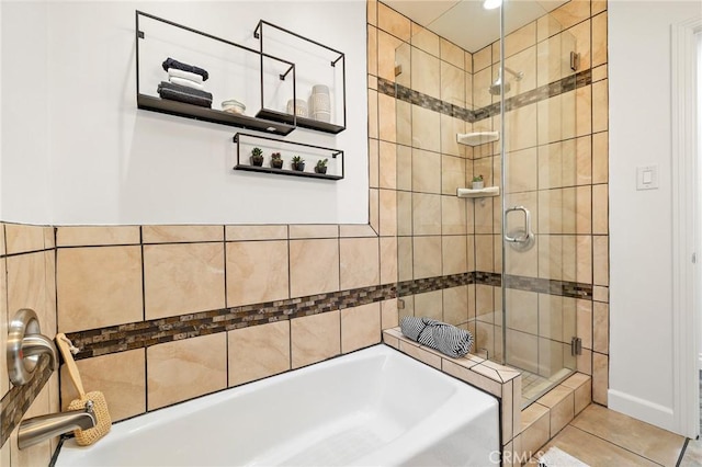 744 S 5th St, Montebello, CA 90640 - full bathroom with a shower stall, a garden tub, and tile patterned flooring