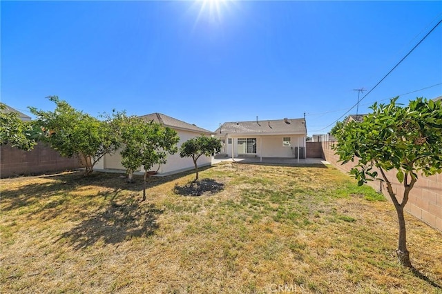 744 S 5th St, Montebello, CA 90640 - fenced backyard featuring a patio area