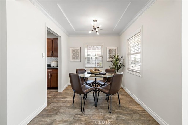 744 S 5th St, Montebello, CA 90640 - dining area with a chandelier, ornamental molding, and a tray ceiling