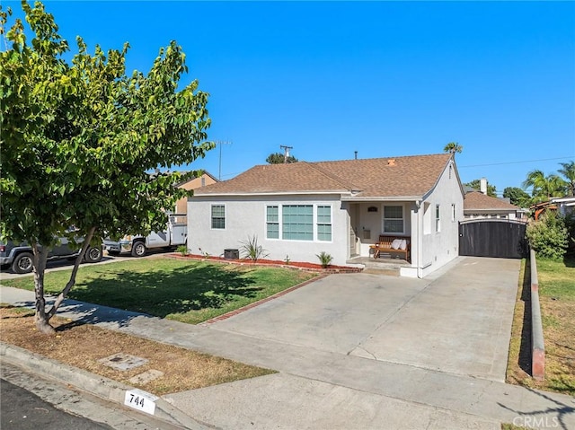 744 S 5th St, Montebello, CA 90640 - view of front of home featuring stucco siding, driveway, and a shingled roof