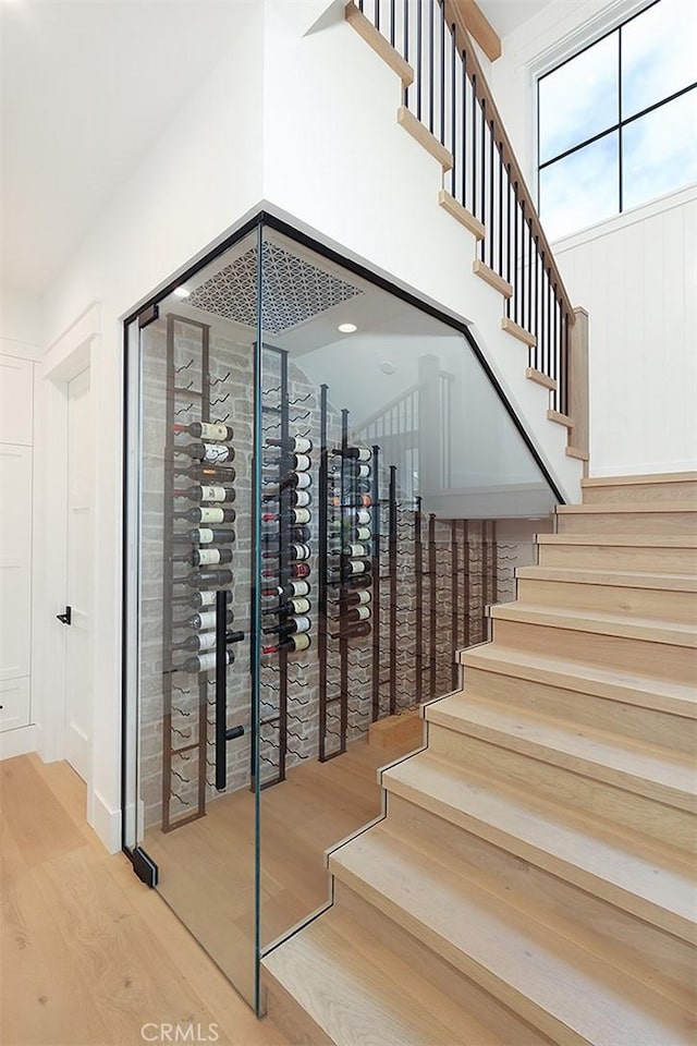 2001 Port Ramsgate Pl, Newport Beach, CA 92660 - wine room with light wood finished floors