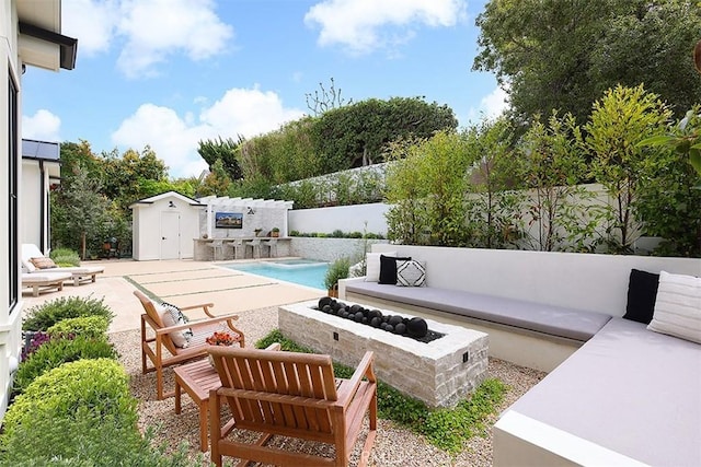 2001 Port Ramsgate Pl, Newport Beach, CA 92660 - fenced backyard featuring an outdoor fire pit and a patio area