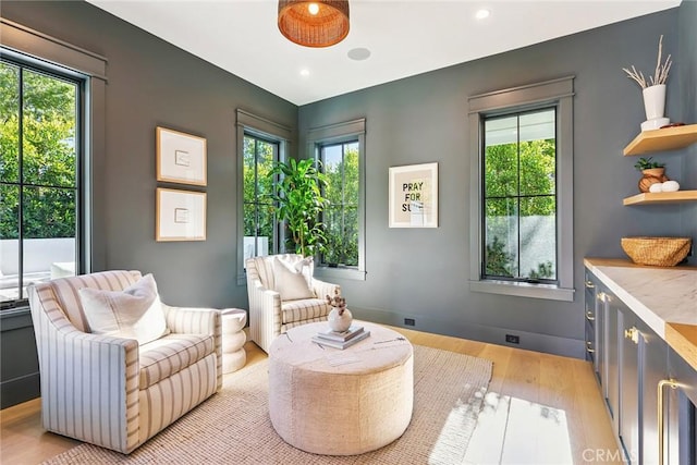 2001 Port Ramsgate Pl, Newport Beach, CA 92660 - sitting room featuring healthy amount of natural light, light wood-type flooring, and recessed lighting