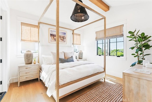 2001 Port Ramsgate Pl, Newport Beach, CA 92660 - bedroom with light wood-type flooring and beamed ceiling