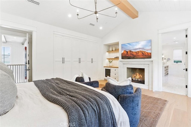 2001 Port Ramsgate Pl, Newport Beach, CA 92660 - bedroom featuring a chandelier, multiple windows, light wood finished floors, a closet, and recessed lighting