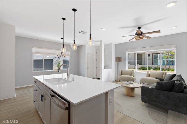 35115 Vine Pl, Fallbrook, CA 92028 - kitchen with stainless steel dishwasher, open floor plan, light wood-style floors, ceiling fan, and recessed lighting