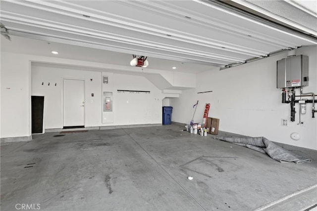 35115 Vine Pl, Fallbrook, CA 92028 - garage with tankless water heater and a garage door opener