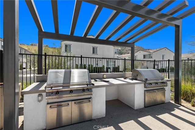 35115 Vine Pl, Fallbrook, CA 92028 - view of patio / terrace with an outdoor kitchen, a pergola, and a residential view