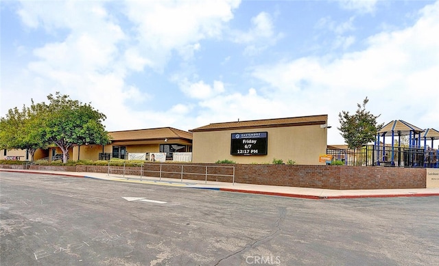 10 Glenhurst Unit 37, Irvine, CA 92604 - view of front facade featuring stucco siding