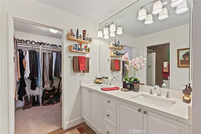 10 Glenhurst Unit 37, Irvine, CA 92604 - full bath with double vanity, a shower stall, and a spacious closet