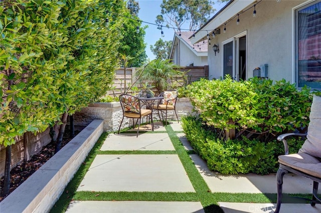 10 Glenhurst Unit 37, Irvine, CA 92604 - fenced backyard with a patio area