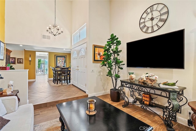 10 Glenhurst Unit 37, Irvine, CA 92604 - living area featuring a chandelier and a high ceiling