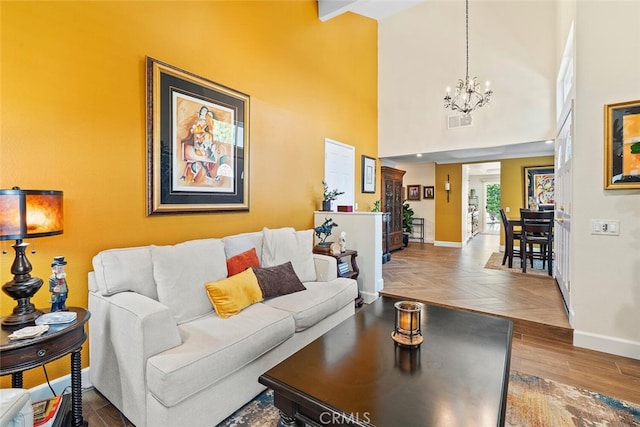 10 Glenhurst Unit 37, Irvine, CA 92604 - living area with a chandelier, a high ceiling, and parquet flooring