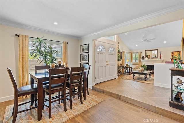 10 Glenhurst Unit 37, Irvine, CA 92604 - dining space featuring healthy amount of natural light, crown molding, ceiling fan, recessed lighting, and a fireplace