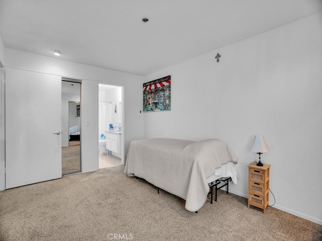 11410 Dolan Unit 328, Downey, CA 90241 - bedroom with carpet floors and ensuite bathroom