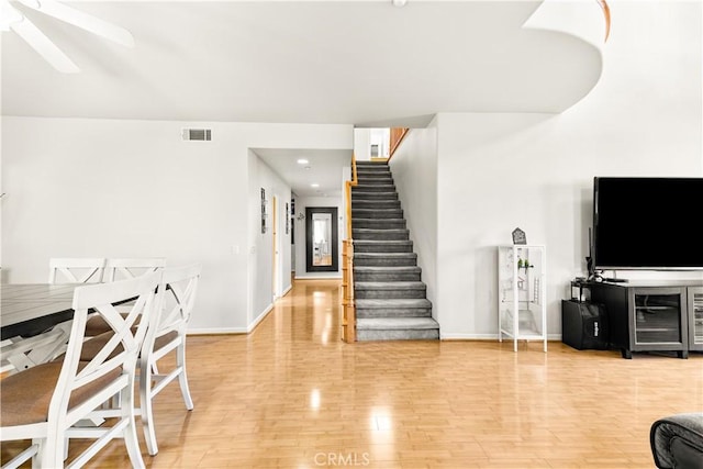 11411 Elliott Ave, El Monte, CA 91732 - living area with stairs, a ceiling fan, and light wood finished floors