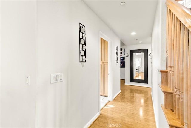 11411 Elliott Ave, El Monte, CA 91732 - corridor with light wood finished floors and recessed lighting