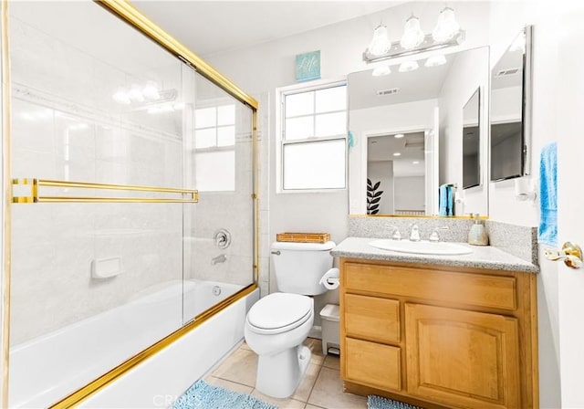 11411 Elliott Ave, El Monte, CA 91732 - bathroom with vanity, tile patterned flooring, and enclosed tub / shower combo