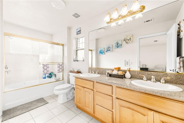11411 Elliott Ave, El Monte, CA 91732 - bathroom with double vanity, tile patterned floors, and combined bath / shower with glass door