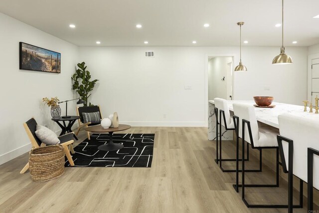 4380 Rolfe Rd, San Diego, CA 92117 - living area featuring light wood-type flooring and recessed lighting
