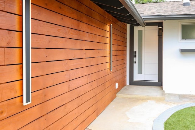 4380 Rolfe Rd, San Diego, CA 92117 - view of exterior entry with a shingled roof