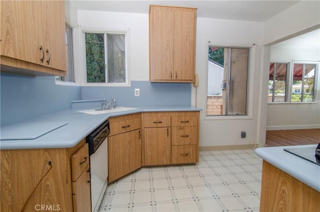10520 Haskell Ave, Granada Hills, CA 91344 - kitchen featuring white dishwasher, light countertops, and light floors