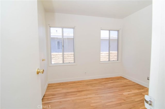 10520 Haskell Ave, Granada Hills, CA 91344 - unfurnished room featuring light wood-type flooring and baseboards