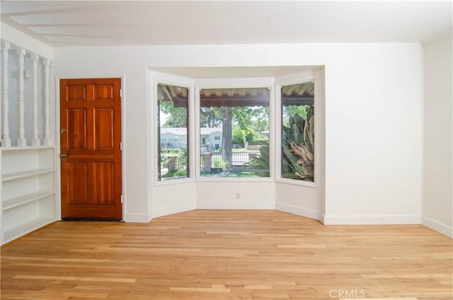 10520 Haskell Ave, Granada Hills, CA 91344 - entrance foyer featuring light wood-style floors and baseboards