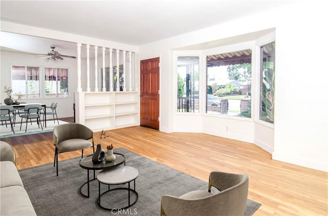 10520 Haskell Ave, Granada Hills, CA 91344 - living area with wood finished floors and a ceiling fan