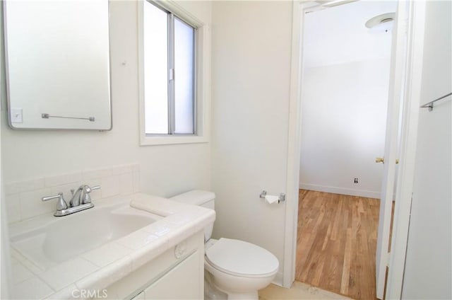 10520 Haskell Ave, Granada Hills, CA 91344 - bathroom featuring vanity and wood finished floors