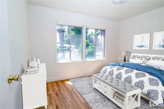 10520 Haskell Ave, Granada Hills, CA 91344 - bedroom with wood finished floors and baseboards